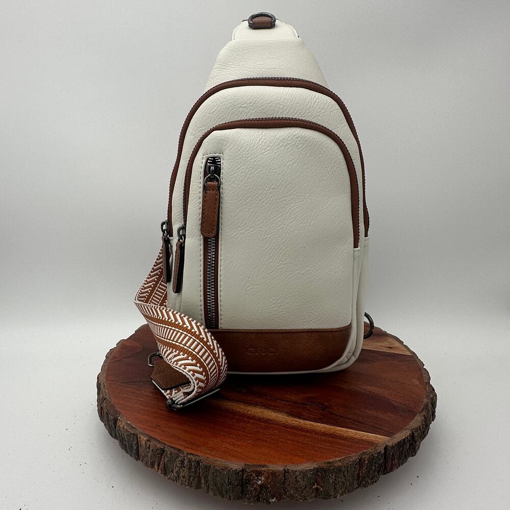 Cluci Crossbody Bag Sling Backpack Cream EUC Travel Quiet Luxury Organization